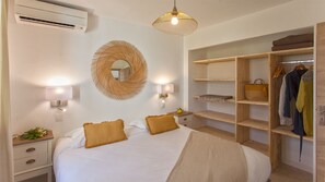 2 habitaciones, tabla de planchar con plancha, cuna de viaje y wifi