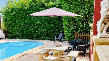 Alberca al aire libre y alberca climatizada