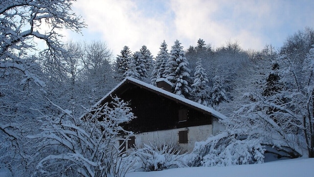 A rustic cabin surrounded by snow-covered trees. - Old Farmhouse (Rupt-Sur-Moselle)