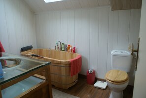 Bathtub, hair dryer, towels