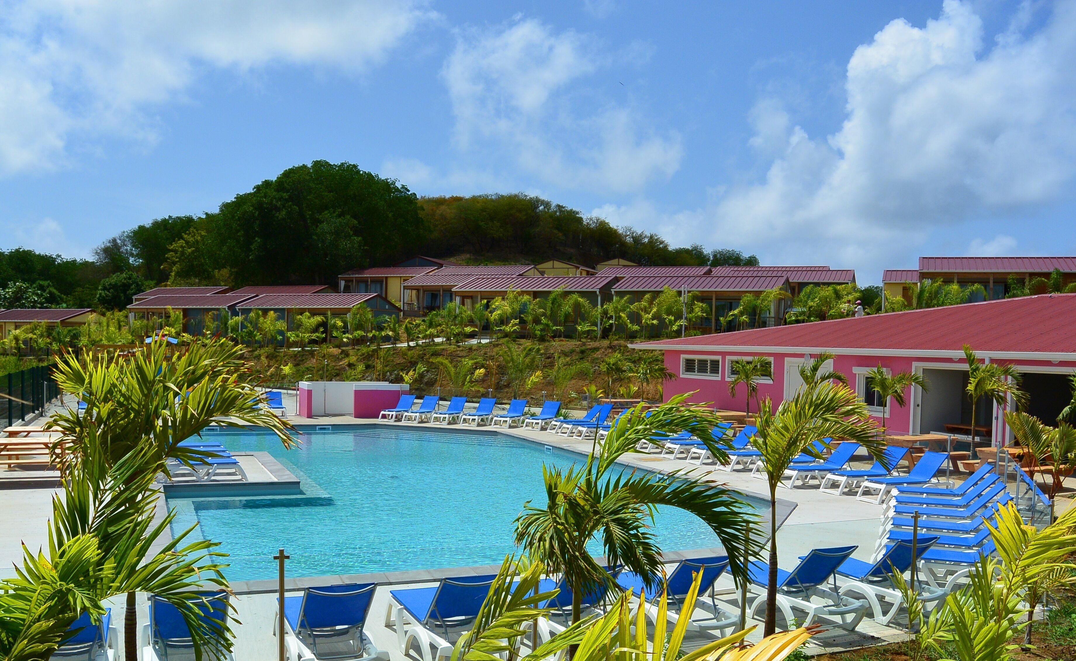 A heated pool, pool loungers