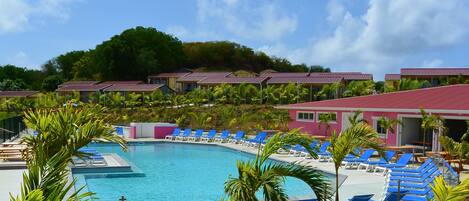 A heated pool, sun loungers
