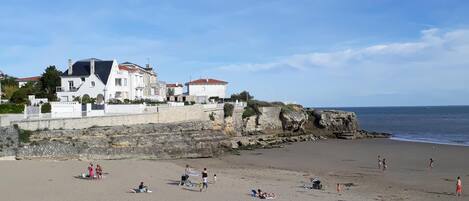 On the beach, sun loungers