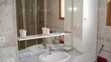 Shower, hair dryer, toilet paper