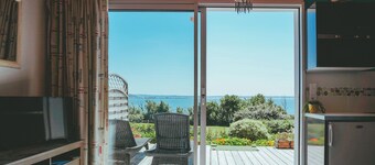 House direct access to the beach from the garden.