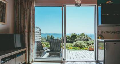 Maison accĂšs directe Ă la plage par le jardin.