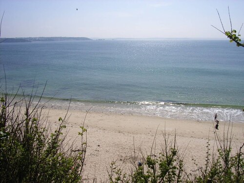 House direct access to the beach from the garden.