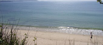 House direct access to the beach from the garden.