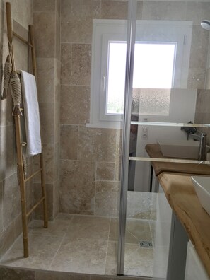 Shower, hair dryer, towels, soap