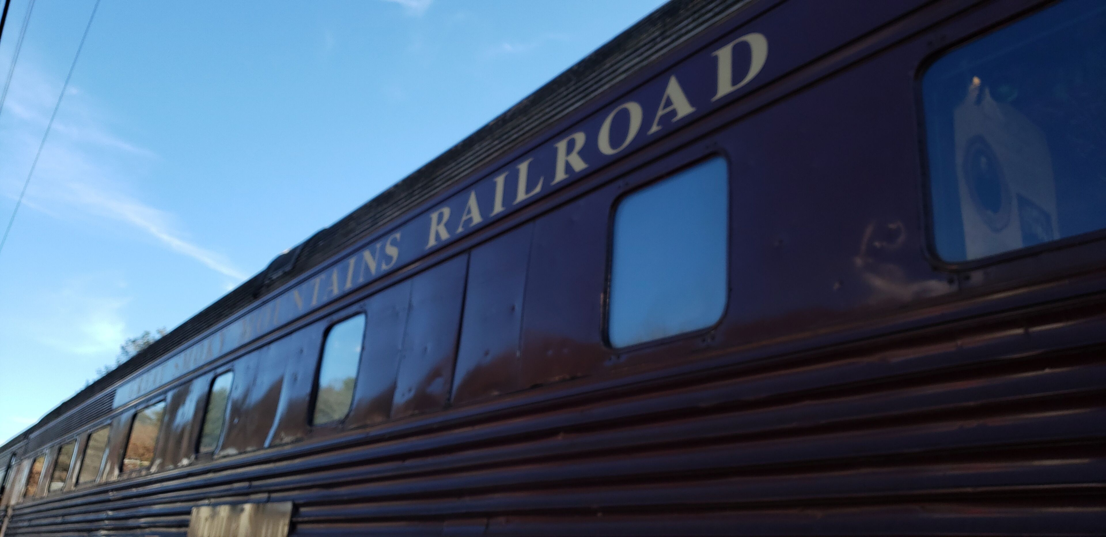 A train with "RAILROAD" written on its side.