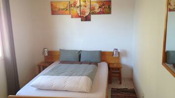 2 quartos, ferros/tĂĄbuas de passar roupa, Wi-Fi, roupa de cama
