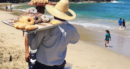 One block to the beach! Three blocks to plaza, stores and public transit