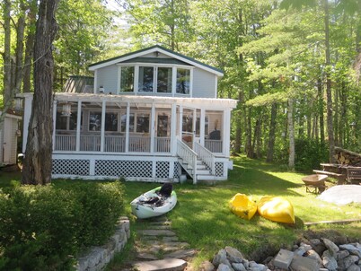 Screen Porch with see thru roof, BQ, 30' from sandy beach,  canoe and 3 kayaks