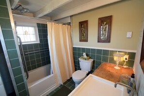 Combined shower/tub, hair dryer, towels, soap
