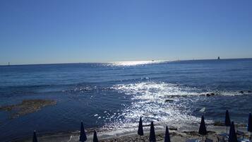 Beach nearby, sun loungers