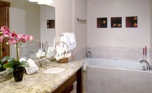 Bathtub, hair dryer, towels, soap