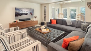 Smart TV, fireplace, foosball, books
