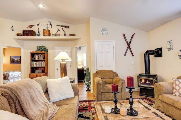 Curl up next to the cozy Fireplace. Just flick a switch - it's a gas