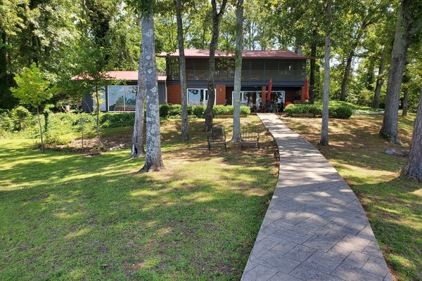 The lovely home is only feet from the water.