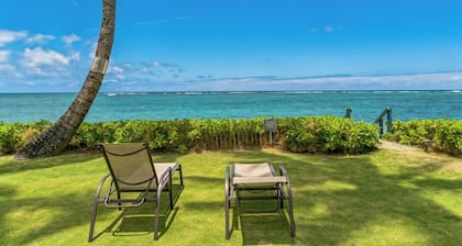 Spacious one bedroom condo on a white sandy beach!