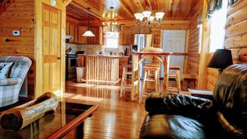 Una Smart TV, una chimenea, videojuegos, libros