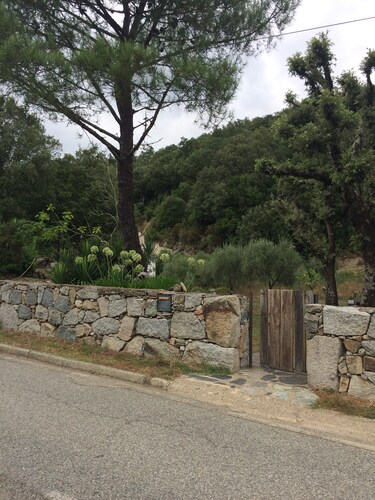 House of character in garden near sea and river