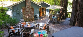 Vintage Cabin with enclosed yard, well stocked Kitchen, Spa and Huge Sunny Deck.