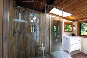 Combined shower/tub, hair dryer, towels, soap
