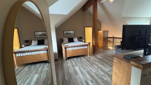 A bedroom with two beds, a TV, and a wooden ceiling. - ⛳️110 Golf Resort, 3 Bed 3 Bath, Sleeps 12, central A/C & private hot tub⛳️ (Kimberley)