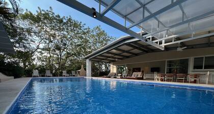 Outdoor Living in Absolute Privacy Steps from the Water's Edge