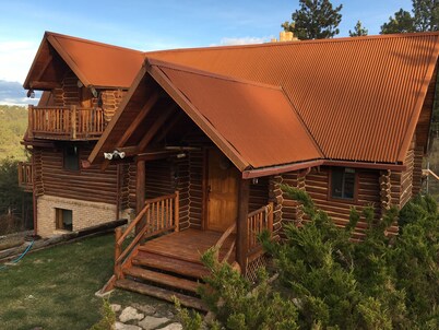 Hand Built Log Cabin in Ponderosa Forest