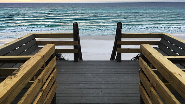 A wooden pier leading to a beach with a view of the ocean. -  Gorgeous Gulf Front Condo on 30A! Back Porch Opens to Private Beach (Seacrest)