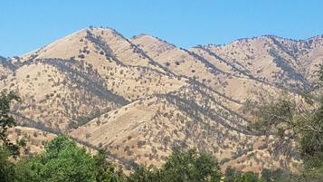 A mountain landscape with a clear sky.
