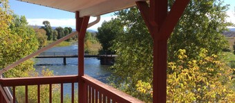A big red barn on the river
