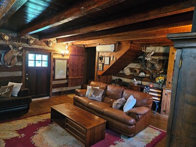 Historic pet friendly cabin with shooting range, and ATV trails on 80 acres.