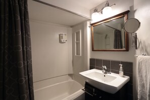Combined shower/tub, hair dryer, towels, soap - Modern Designed Condo, Walking Distance From Chairlift With Mountain View  (Whistler)