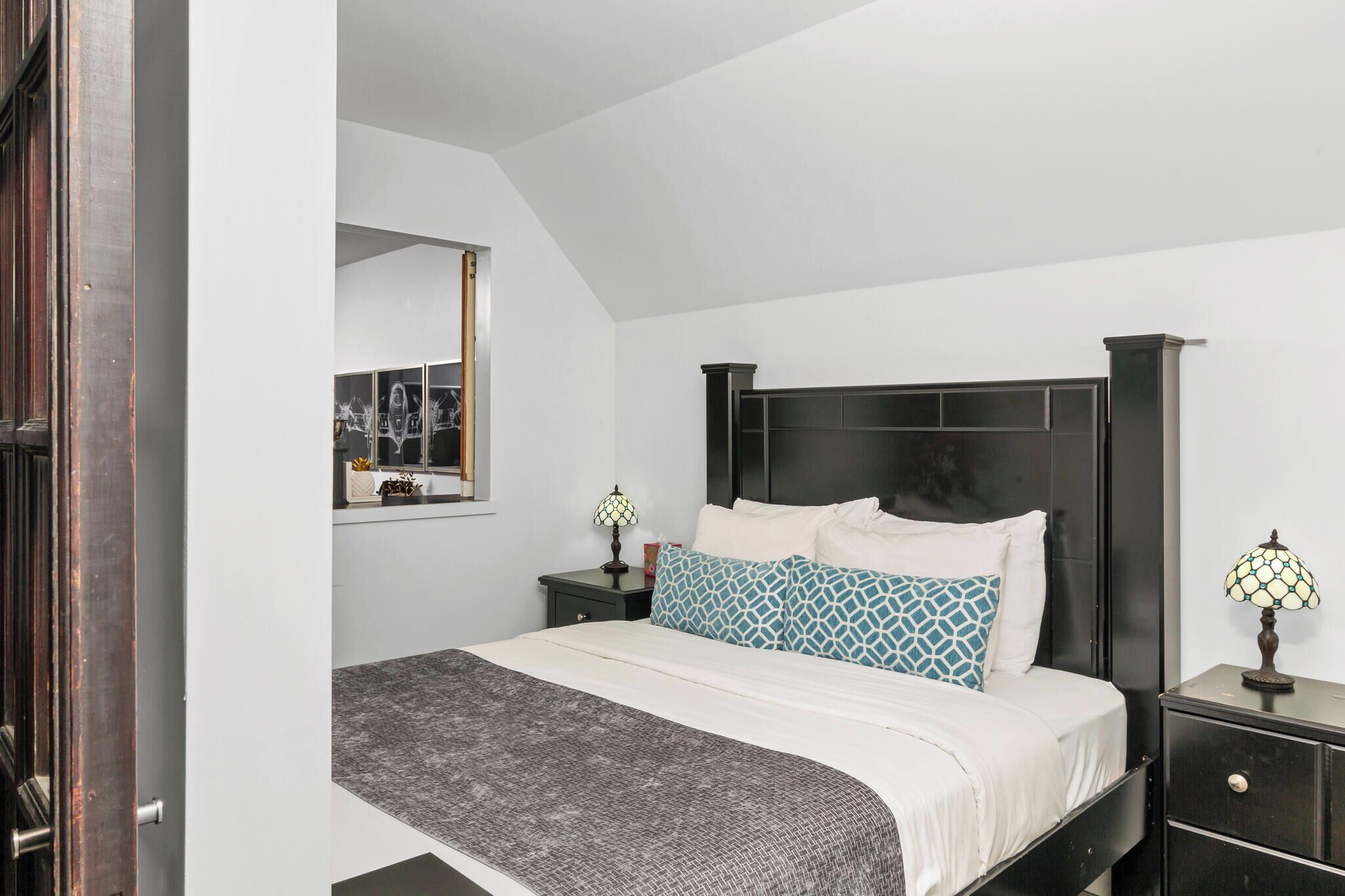 This queen bed is in the walkout basement.  There's a bathroom down there too.
