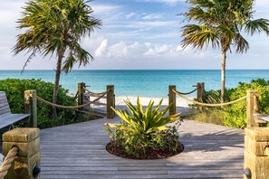On the beach, sun loungers, beach towels