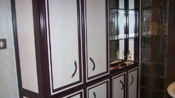 Combined shower/bathtub, hair dryer, towels, soap