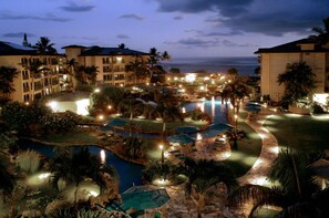 A resort with multiple swimming pools, palm trees, and beachfront views. - Penthouse - October Special Pricing
Beautiful - Sleeping Giant Mtn View (Kapaa)