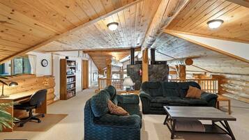 Smart TV, fireplace, DVD player, books