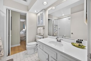 Combined shower/tub, hair dryer, towels, toilet paper