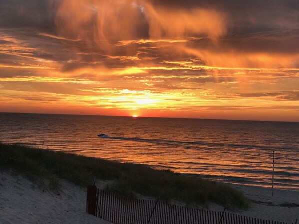On the beach, sun loungers, beach towels