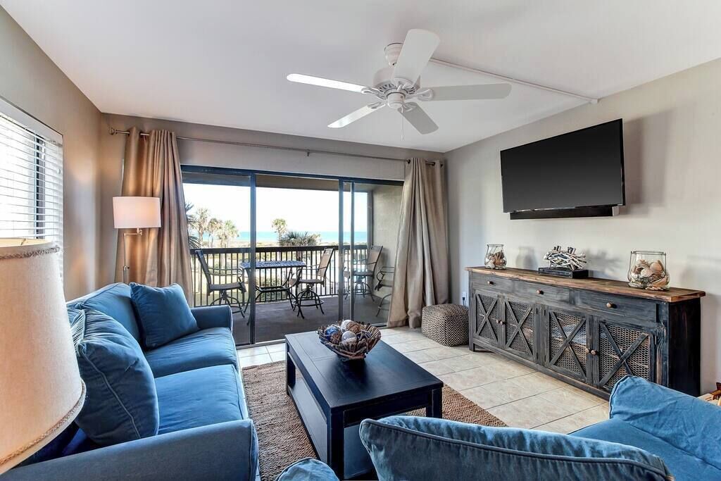 Living room, ocean and pool view