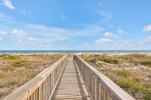 On the beach, sun-loungers