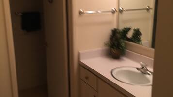 Combined shower/tub, hair dryer, towels, soap