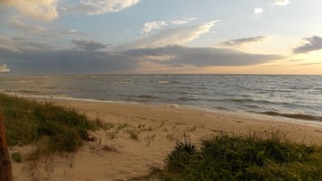 On the beach, sun loungers