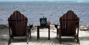 On the beach, sun loungers, beach towels