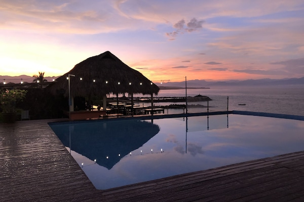 Pool on roof with bar in background! Another lovely sunset!