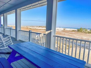 Outdoor dining - #1 Reviewed Home on Navarre Beach Forever Views 33' Pool Outdoor Bar/TVs Hot Tub (Navarre)